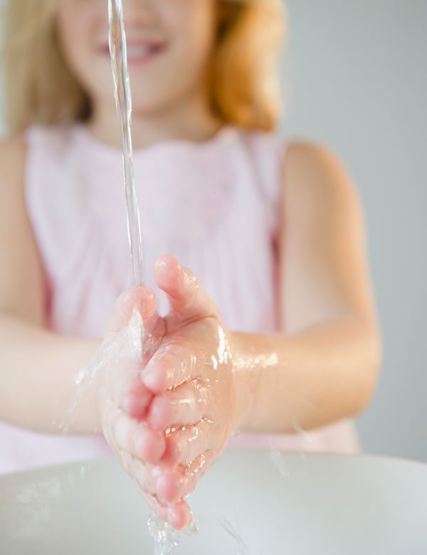 Pinckney Well Drilling & Geothermal | Coastal areas of SC and GA | little girl washing hands in clean water